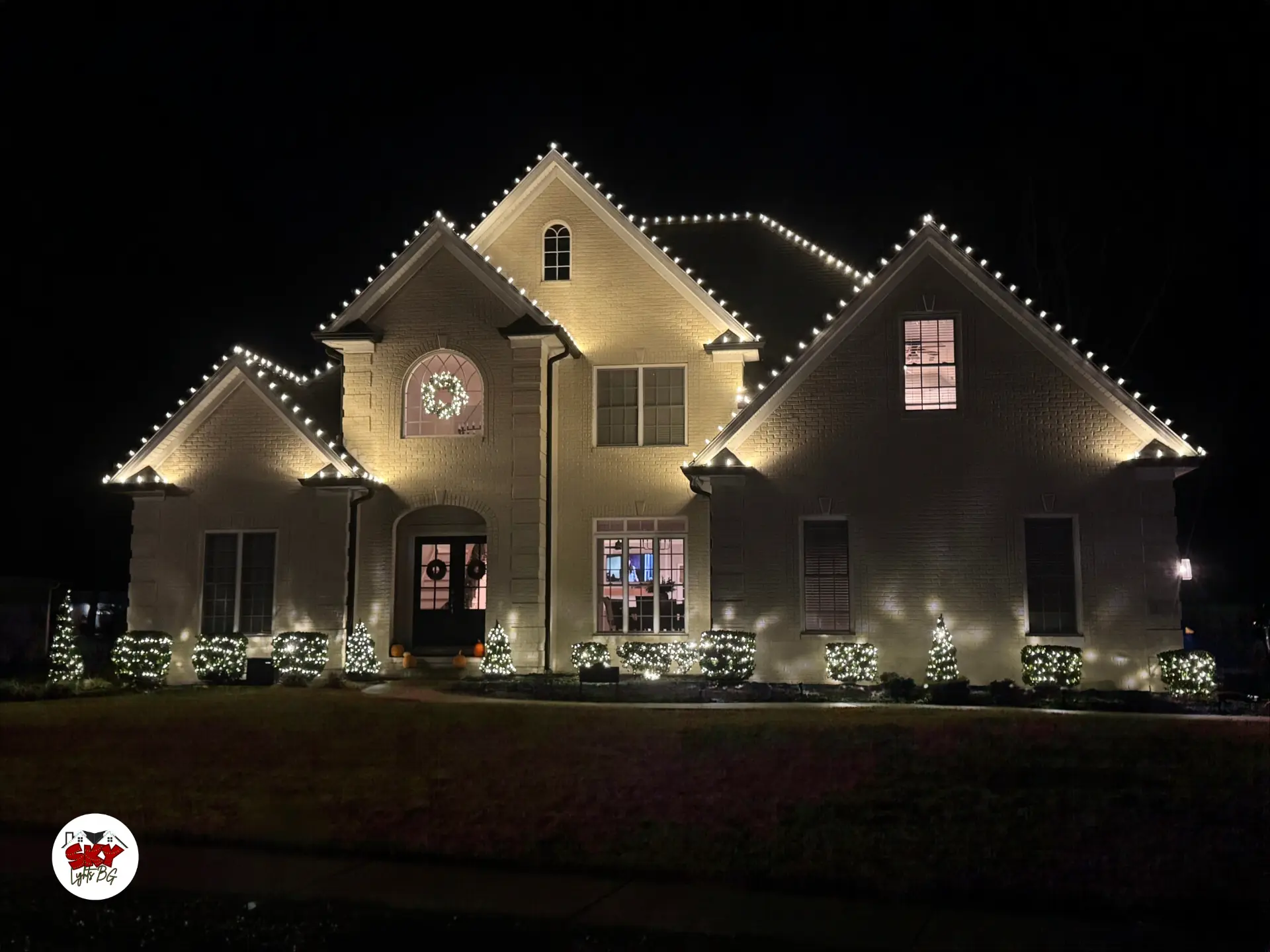 Roofline, gables, wreath & bushes — full front